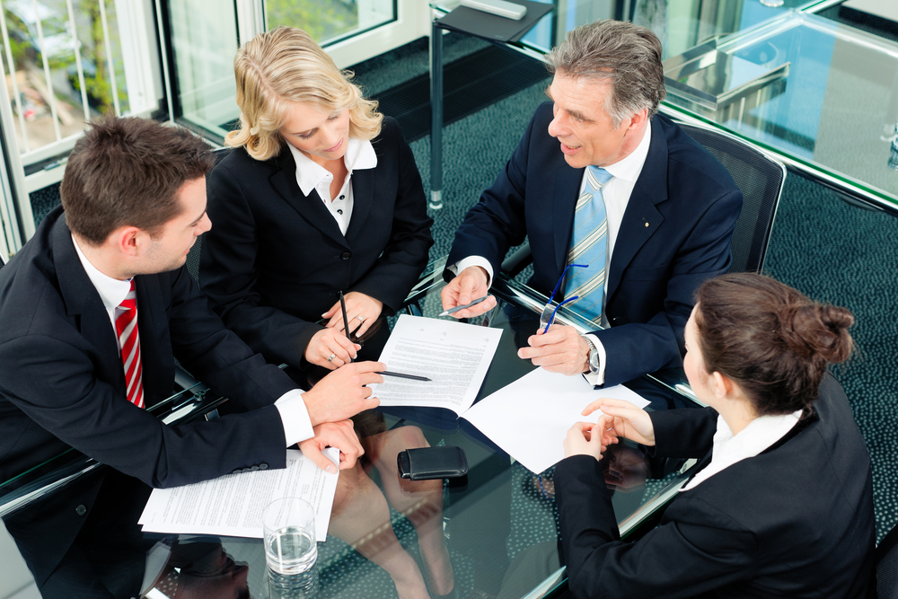 Business,-,Meeting,In,An,Office;,The,Businesspeople,Are,Discussing