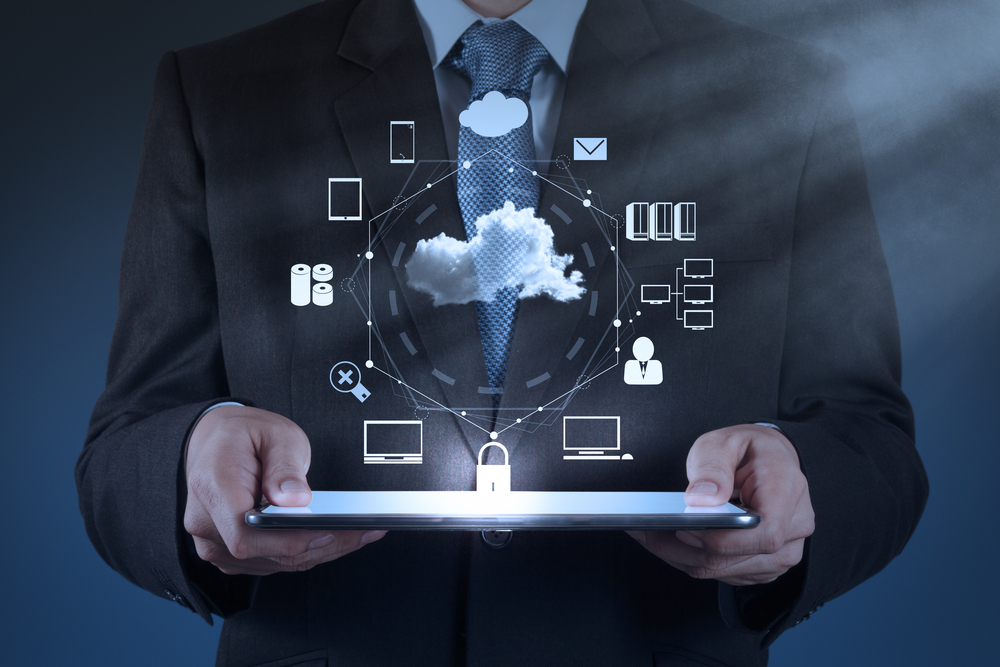 Businessman,Hand,Working,With,A,Cloud,Computing,Diagram,On,The